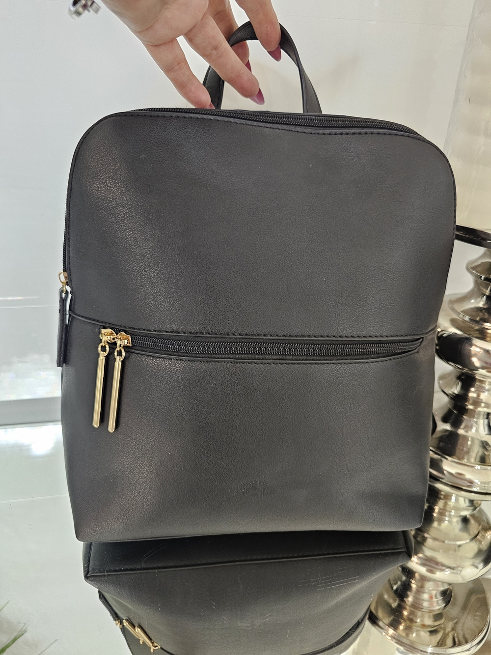 Sleek Black Faux Leather Backpack with Gold Hardware